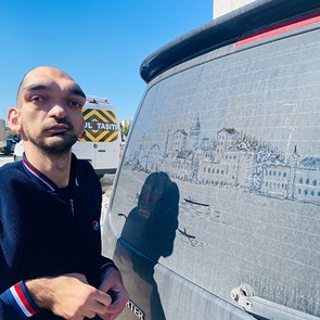Hearing-Impaired Artist Turns Dusty Car Windows into Istanbul Masterpieces