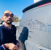 Hearing-Impaired Artist Turns Dusty Car Windows into Istanbul Masterpieces