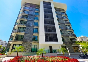 1+1 apartment from a well-known developer 200 m from the sea in the Tosmur area