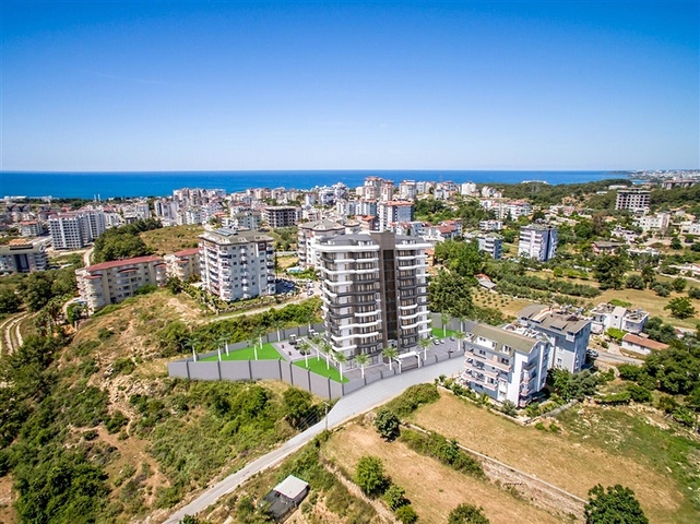 1+1 apartment in a new complex in Avsallar district