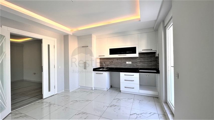 2+1 penthouse in the center of Mahmutlar with mountain view 