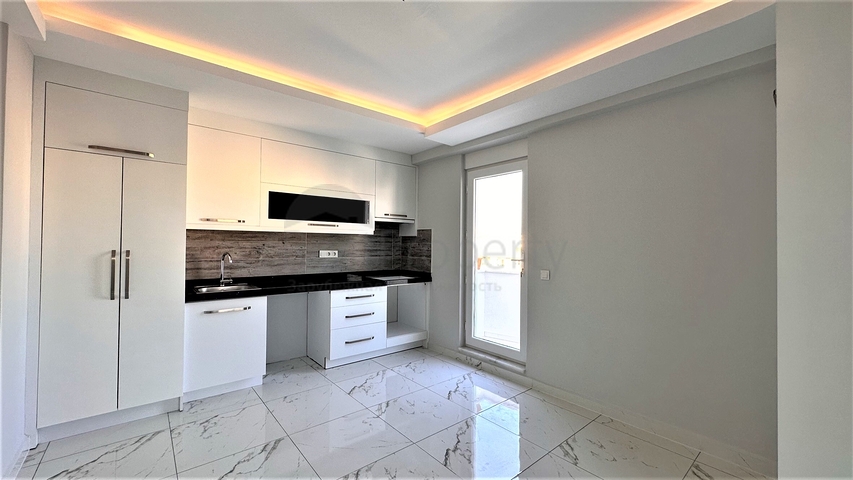 2+1 penthouse in the center of Mahmutlar with mountain view 