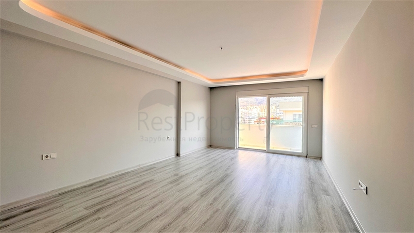 2+1 penthouse in the center of Mahmutlar with mountain view 