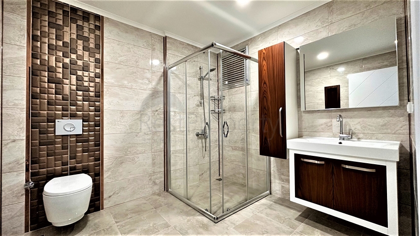 2+1 penthouse in the center of Mahmutlar with mountain view 