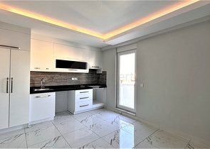 2+1 penthouse in the center of Mahmutlar with mountain view 