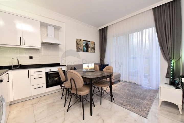 One-bedroom furnished apartment in a complex in a pine forest