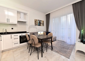 One-bedroom furnished apartment in a complex in a pine forest