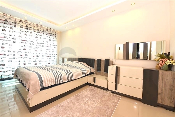 2+1 apartment in a respectable complex 50 meters from the beach in Kargicak district 