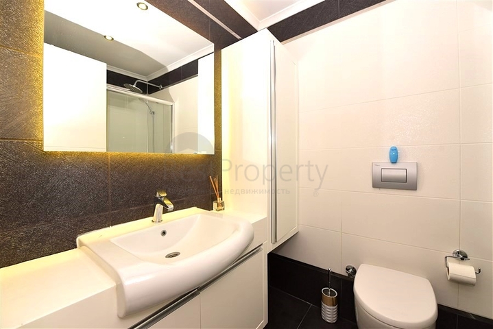 2+1 apartment in a respectable complex 50 meters from the beach in Kargicak district 