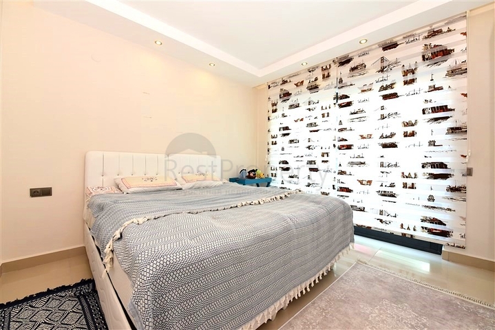 2+1 apartment in a respectable complex 50 meters from the beach in Kargicak district 