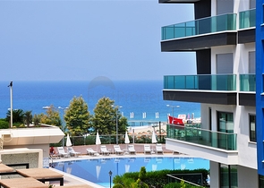 2+1 apartment in a respectable complex 50 meters from the beach in Kargicak district 