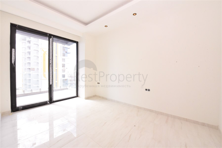 1+1 apartment on the first coastline in Mahmutlar