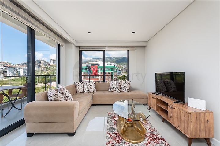 1+1 apartment in a new complex with infrastructure in Oba district 