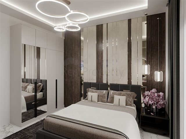 1+1 apartment in a building under construction in Mahmutlar district