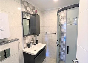 Spacious 4+1 penthouse in the center of Alanya with a view of the fortress