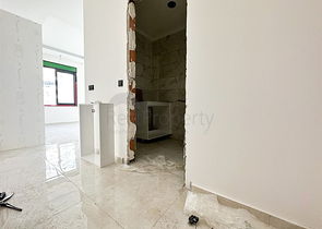 1+1 apartment in a building under construction in Mahmutlar district