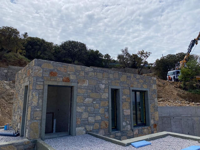 Stone villas overlooking the sea and the historic 