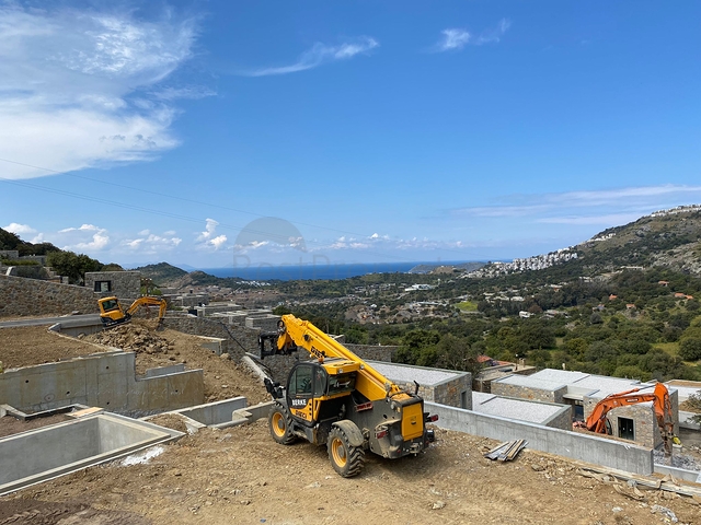 Stone villas overlooking the sea and the historic 