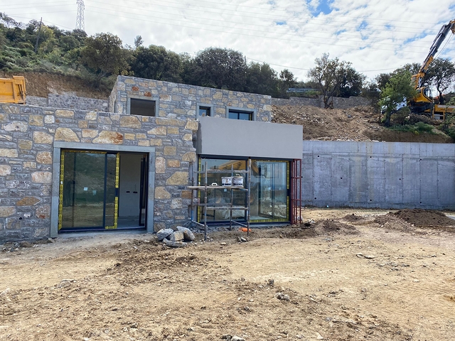 Stone villas overlooking the sea and the historic 