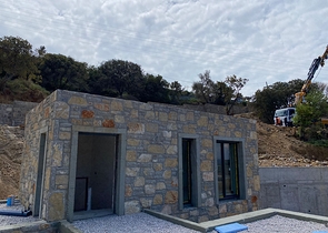 Stone villas overlooking the sea and the historic 