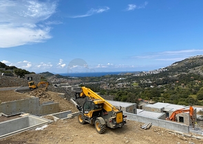 Stone villas overlooking the sea and the historic 