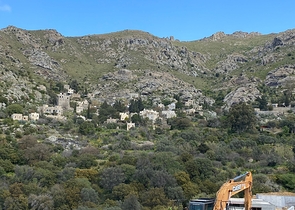 Stone villas overlooking the sea and the historic 