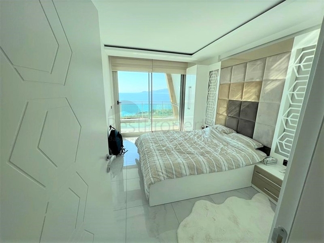 Furnished 1+1 apartment with beautiful sea view in Kargicak area