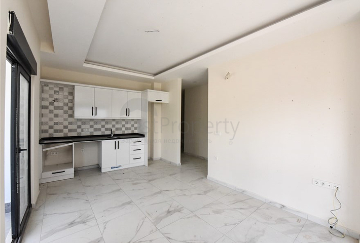 1+1 apartment in a new complex without infrastructure in Mahmutlar district