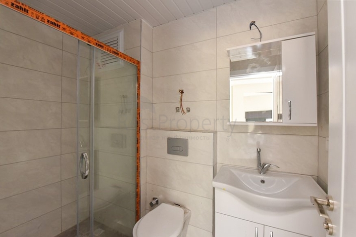 1+1 apartment in a new complex without infrastructure in Mahmutlar district