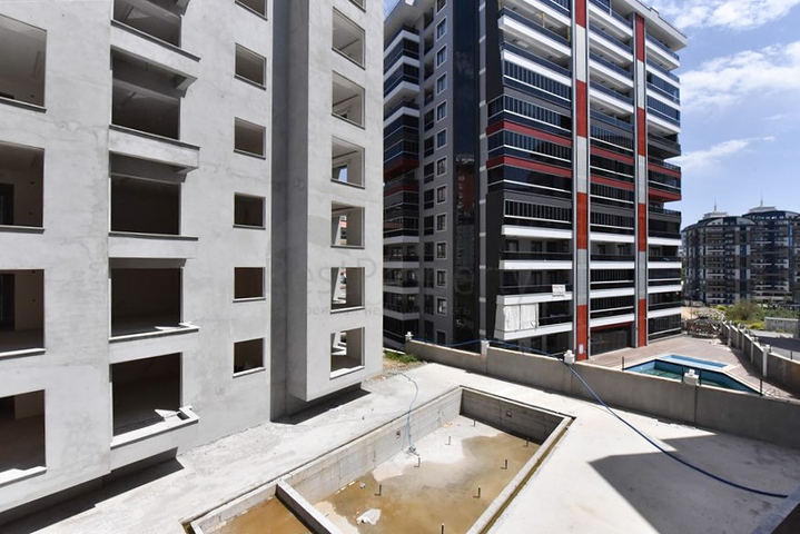 1+1 apartment in a new complex without infrastructure in Mahmutlar district