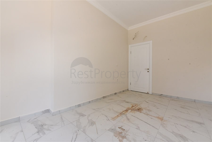 1+1 apartment in a new complex without infrastructure in Mahmutlar district