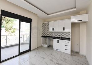 1+1 apartment in a new complex without infrastructure in Mahmutlar district