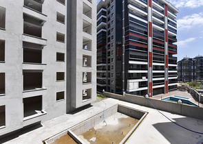 1+1 apartment in a new complex without infrastructure in Mahmutlar district