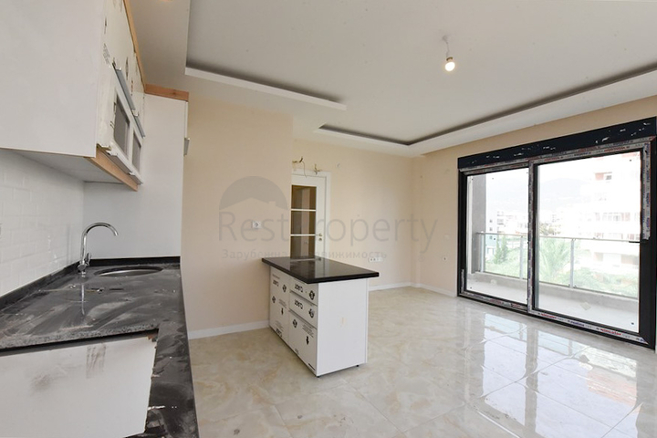 1+1 apartment in an attractive complex in Tosmur district 