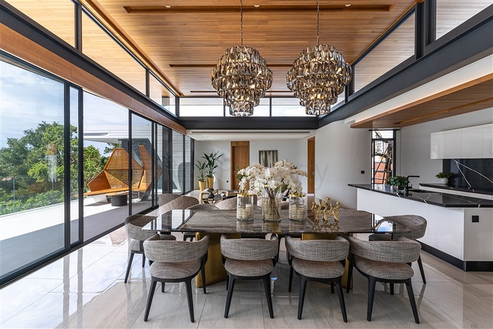 Luxury villa complex with pool and panoramic views of Phuket hills