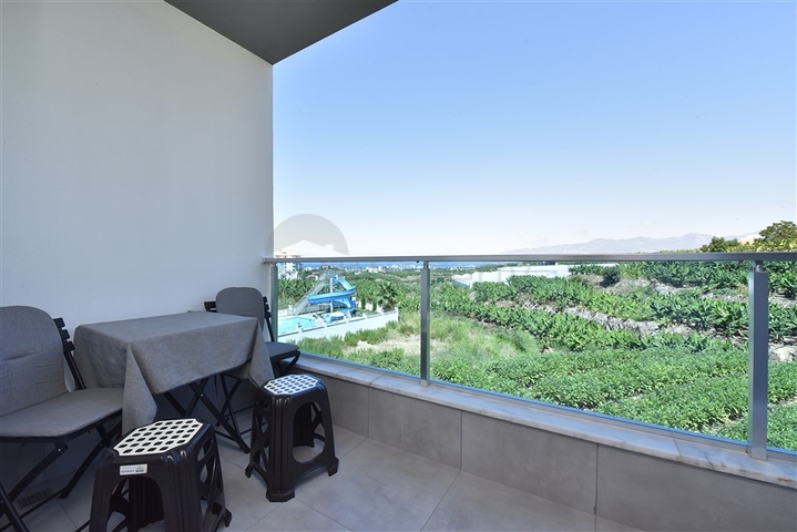 Furnished 1+1 apartment with sea and mountain views in Mahmutlar area