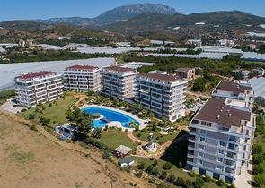 2+1 apartment in Demirtas district in a complex with rich infrastructure 