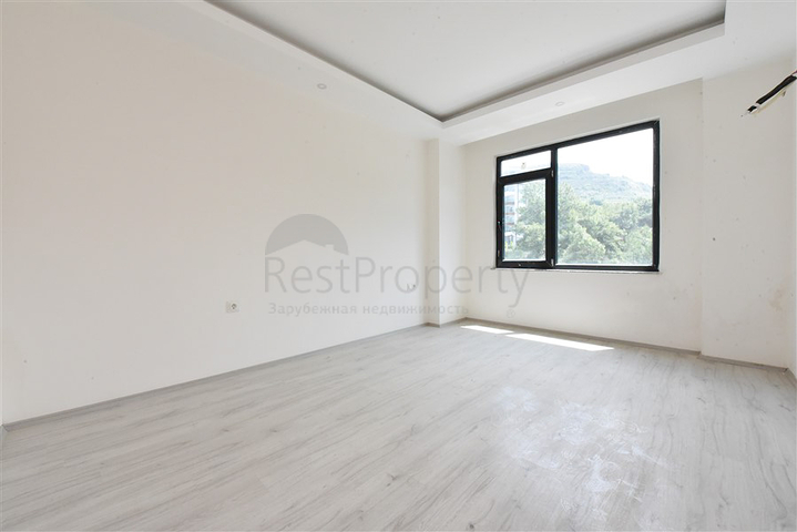 2+1 apartment in the picturesque Kargicak area, just 300 m from the sea