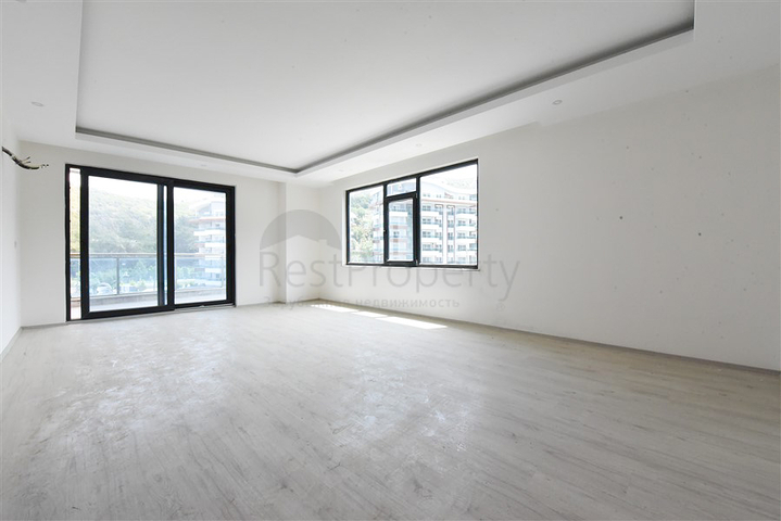 2+1 apartment in the picturesque Kargicak area, just 300 m from the sea