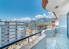 Spacious apartment in Mahmutlar area with sea and mountain views