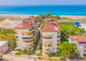 2+1 apartment on the first coastline in Demirtas district