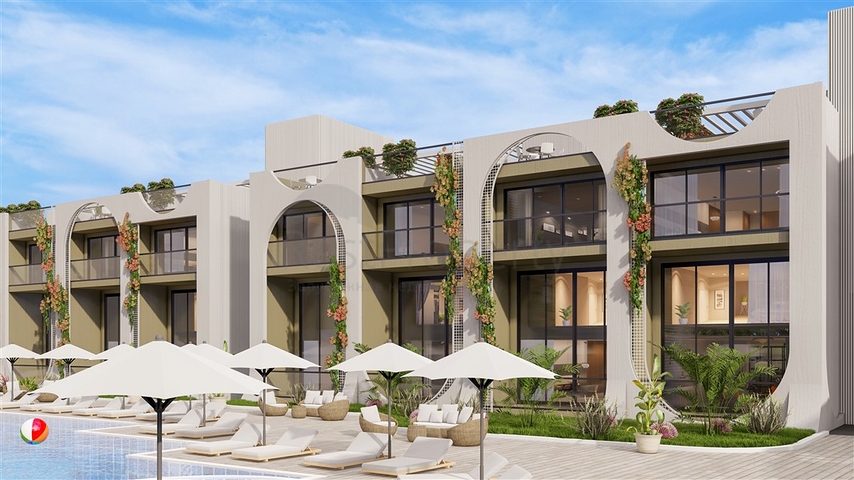 A new project of townhouses 500 meters from the sea