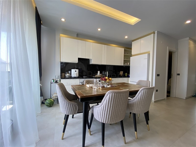 Two-bedroom penthouse in walking distance from the sea with designer renovation