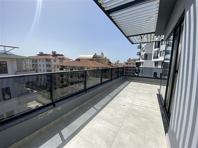 Two-bedroom penthouse in walking distance from the sea with designer renovation