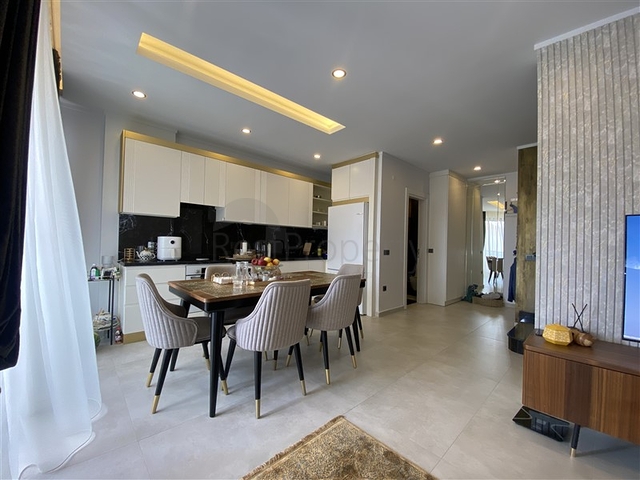 Two-bedroom penthouse in walking distance from the sea with designer renovation