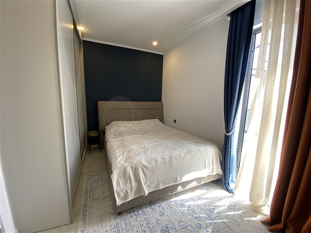 Two-bedroom penthouse in walking distance from the sea with designer renovation