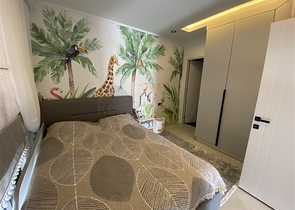 Two-bedroom penthouse in walking distance from the sea with designer renovation