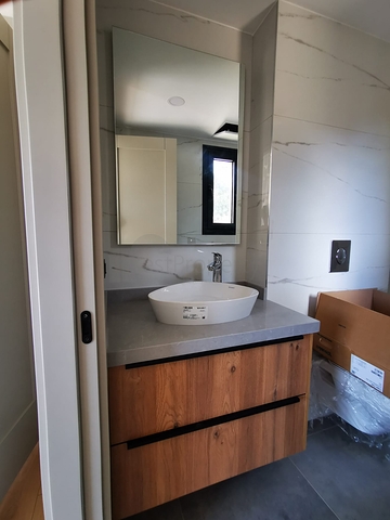 Villas in the picturesque area of Turkbukyu, surrounded by dense greenery. 