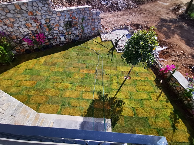 Villas in the picturesque area of Turkbukyu, surrounded by dense greenery. 