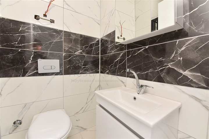 Apartment 1+1, in the Oba area.